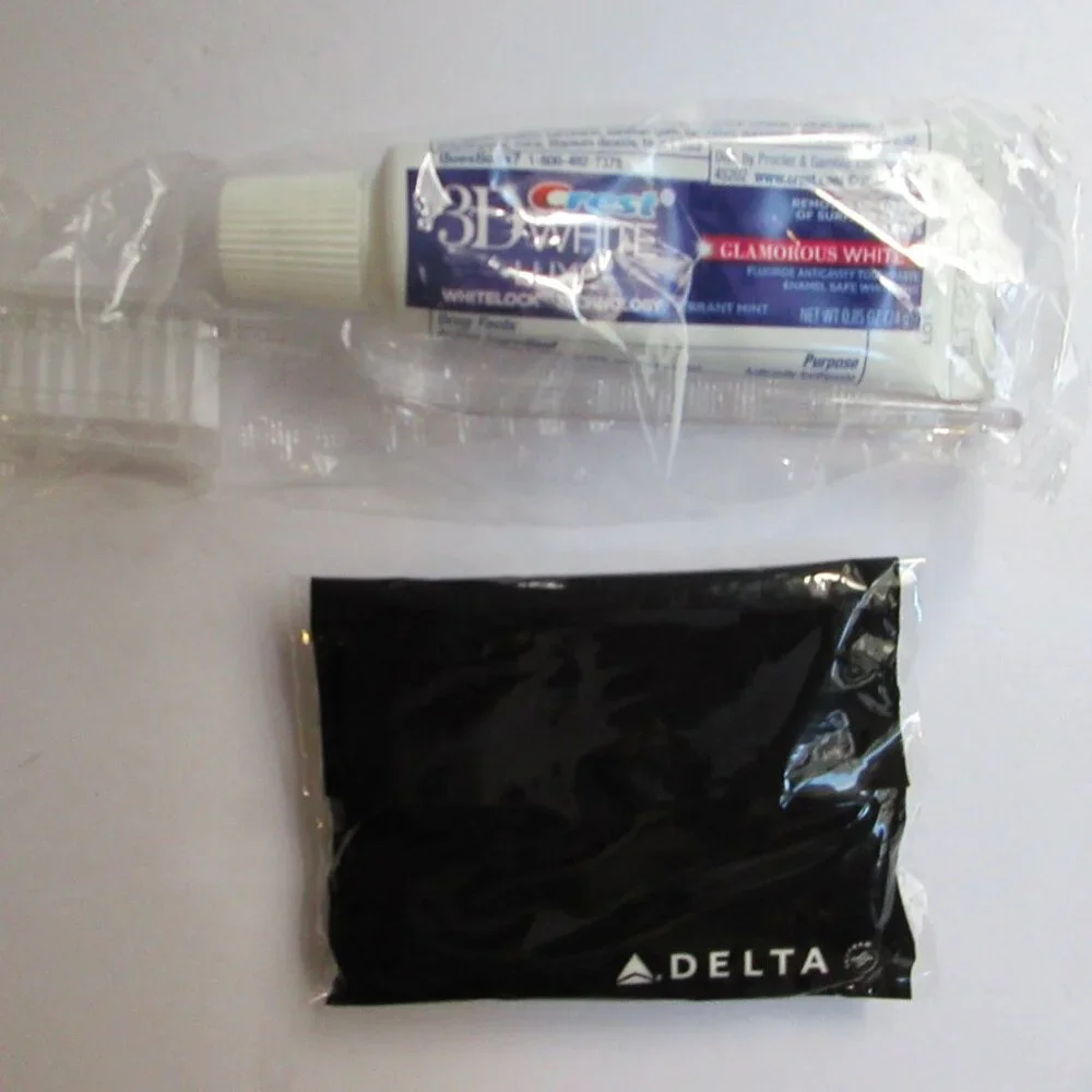 TUMI Delta Air Travel Cosmetic Makeup Case Bag Eye Mask Gray Amenity Kit Zip Top